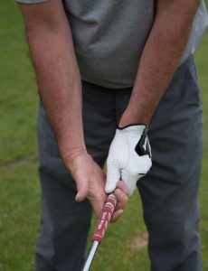 Golfer showing hand position of the golf grip